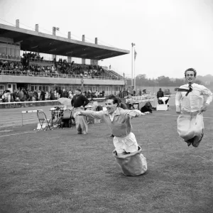 Print of two men in a sack race at Copthall Stadium Print of two men in a sack race at Copthall Stadium