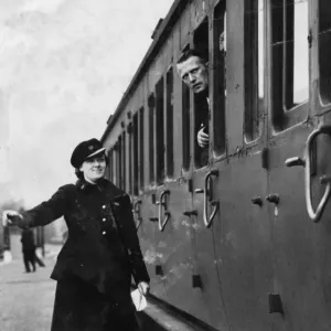 Print of Female Stationmaster, June 1941 Print of Female Stationmaster, June 1941