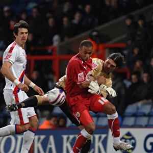 Nicky Maynard battles for the ball with Juilian Speroni