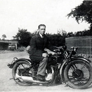 Biker on his 1929 / 30 Rudge motorcycle