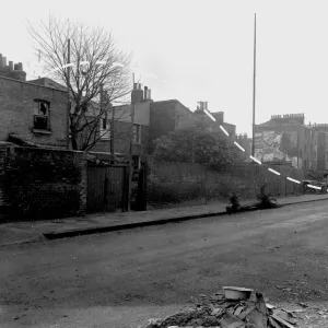 Blitz in London -- vehicle on roof in Peckham Hill Street