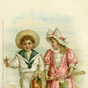 Boy and girl on the sea shore