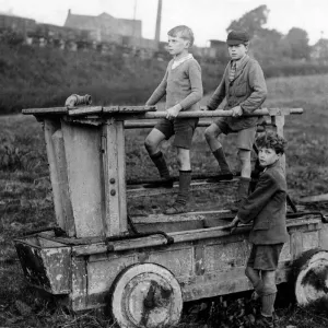 Boys on an 18th century fire engine, Wirksworth