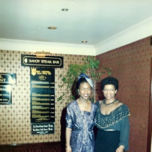 Two British Caribbean women standing in a restaurant in Nott