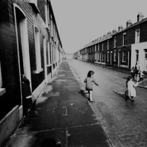 Children skipping in a street, Belfast, Northern Ireland