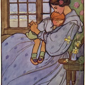 Una pequeña niña durmiendo en el regazo de su madre