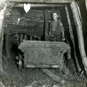 Coal miner filling truck, South Wales mine