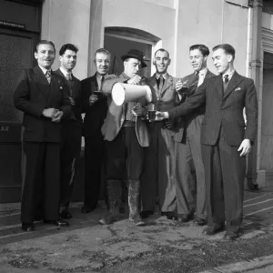 Darts Team celebrate with a jug of ale, Walton, Essex