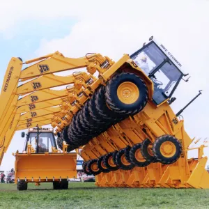 Display of JCB Extradig diggers in a field