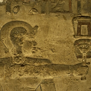 Egyptian Art. Dendera. Hathor Temple. The god Ihy holding a