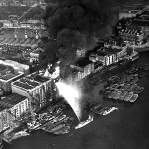 Fireboat tackling fire at Colonial Wharf, East London