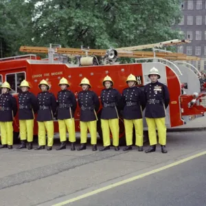 Firefighters on parade in front of their appliance