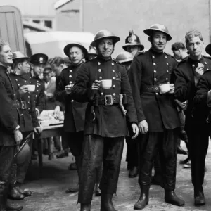 Firefighters on a tea break after fire St Katherines Dock