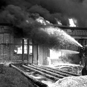 Foam applied at oil tank fire, Thames Haven, WW2