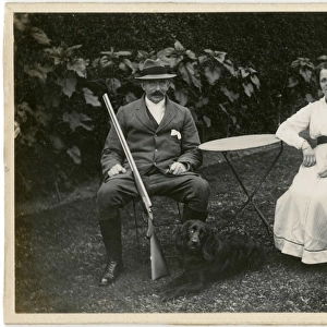 The Gamekeeper and his wife (and their pet black spaniel)