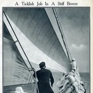 Gathering headsail on board Hamburg at Cowes, IOW