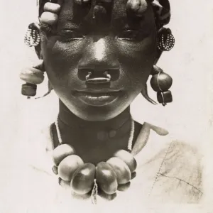 Girl from Mali with wonderful beads and headdress