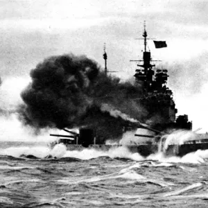 HMS Duke of York firing a broadside; Second World War