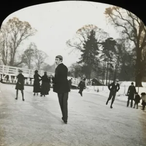 Ice skaters skate over a frozen river