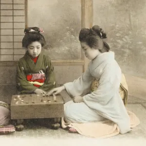 Three Japanese Geisha girls playing Go