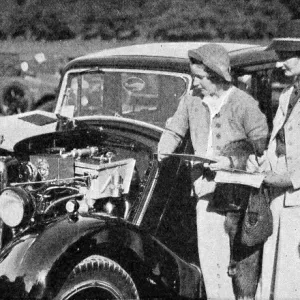 Kay Petre & E. Wisdom judging coachwork at Morris Rally