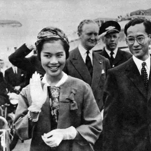 King Bhumibol Adulyadej and Queen Sirikit departing