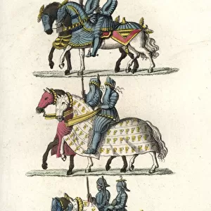 Knights in jousting armour at a medieval tournament