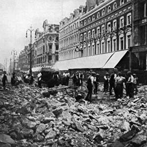 London in 1919 - rebuilding roads outside John Lewis
