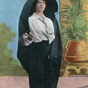A Maltese lady wearing a traditional over-head shawl