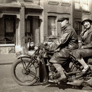 Man & woman on their 1928 / 9 New Imperial motorcycle