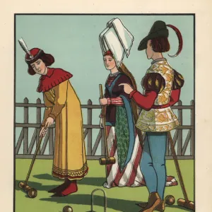 Medieval men and woman playing croquet with mallet and hoops