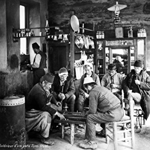 Men playing backgammon in Turkish cafe