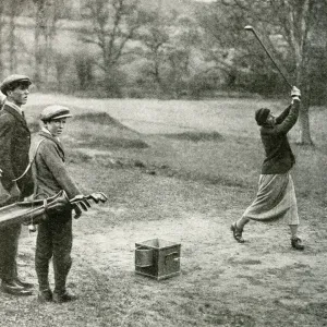 Men and women playing golf at Beaconsfield, Buckinghamshire