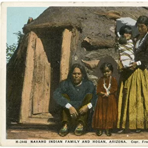 Navajo Indian family and their hut, Arizona, USA