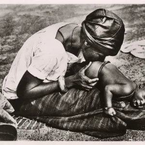 Niger, West Africa - Baby receiving an enema