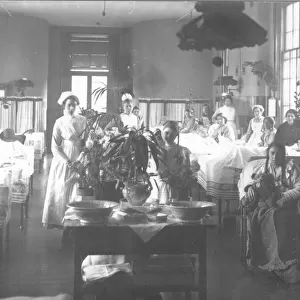 Nurses and patients in female ward