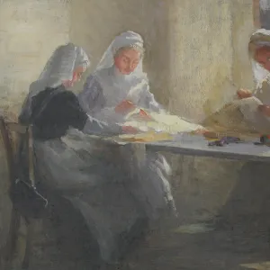 Three nurses sewing at a table, WW1