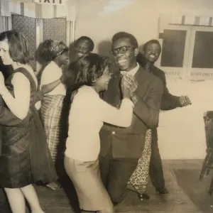 People from diverse ethnicity on the dance floor at NHS staf