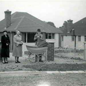 People with Vintage Pram, Fawley, Hampshire