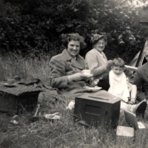 Picnic out of the boot of a Morris 8 E-series