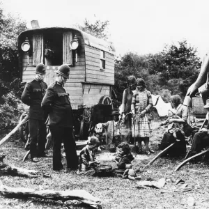 Policeman talk to Gypsies on Epsom Downs