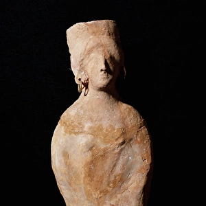 Punic Art. Figurine of a goddess with slopes. Terracota. Fro