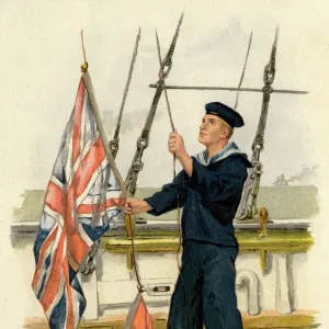 Royal Navy sailor with Union Jack and Red Ensign flags