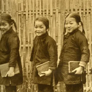 Four schoolgirls of Changsha with books, China, East Asia