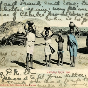 South Africa - Zulu Natives Carrying Cafir Beer