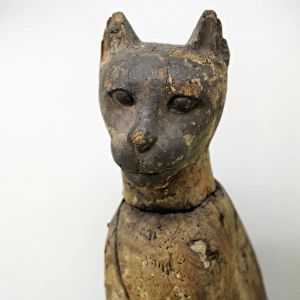 Statuette of a cat depicting goddess Bastet. Wood