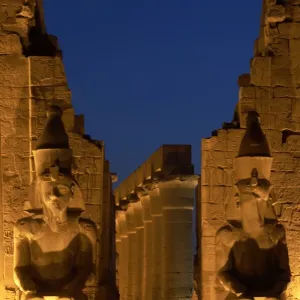 Temple of Luxor. Night view of the colossi of Ramses II