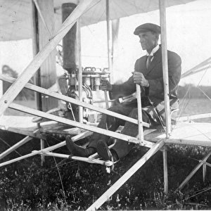 Wilbur Wright in his machine in 1905