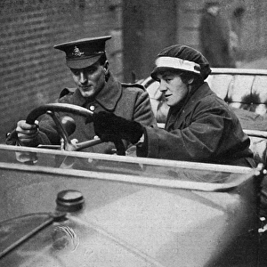 Woman motor driver teaching soldier to drive, WW1