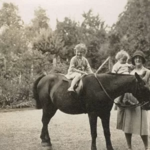 Two young children, a pony and their nurse - Oddington House